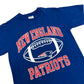 Early 2000s Champion New England Patriots Navy Blue Spell-Out Logo T-Shirt - Size Medium (Fits M/L)
