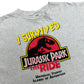 Vintage 1990s I Survived Jurassic Park The Ride Grey Graphic T-Shirt - Size XL (Boxy Fit)